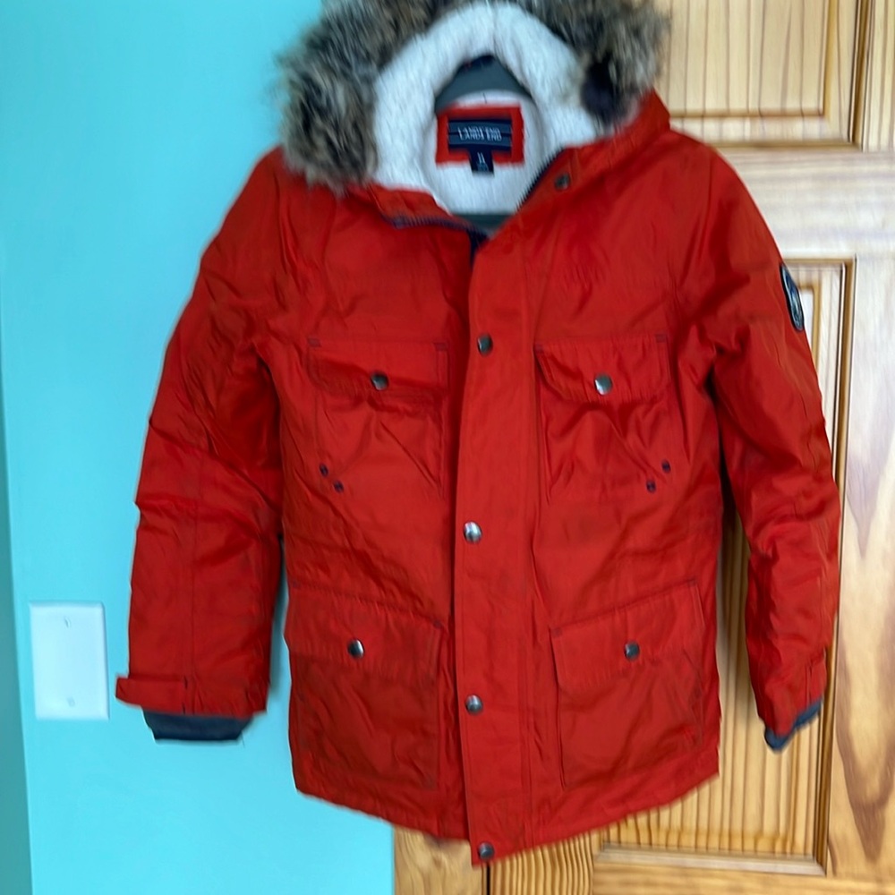 Orange lands and winter coat size 10/12 M boys.